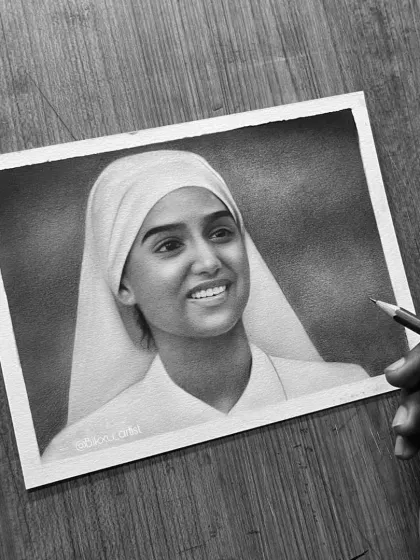 The completed portrait. I used soft blending techniques to create a gentle and serene expression.