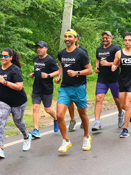 The squad running together, pacing each other through a humid morning. This is what teamwork looks like on the road. We start together and finish stronger.
