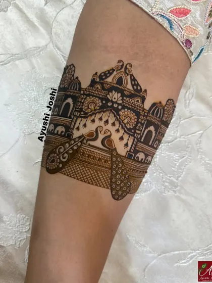 A close-up of a royal palace armband with peacocks, showcasing the intricate architectural details.