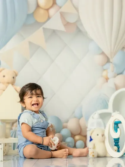 A candid moment from a first birthday shoot. Even if there are a few tears, I capture the real emotions of the day, creating authentic memories.