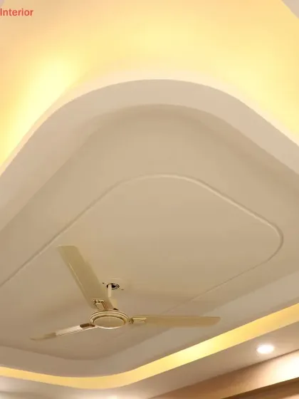 A close-up of a beautifully executed curved tray ceiling, where the soft glow of the cove lighting enhances its gentle shape.