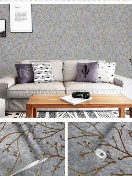 A collage showing a grey wallpaper with a bronze branch pattern in a living room setting and as a roll.