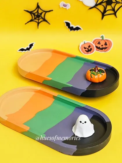 My Halloween palette oval trays are so versatile. This one features bold stripes of orange, green, purple, and black, perfect for serving snacks or organizing makeup.