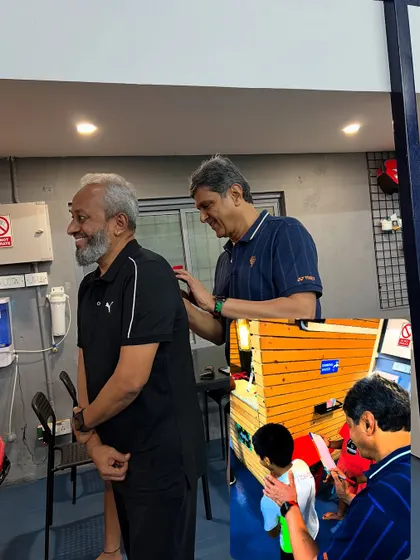 Prakash Padukone signing memorabilia at the inauguration of our new center. His personal involvement is a cornerstone of our academy's identity.