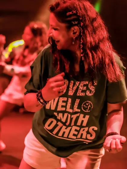Caught in a moment of pure joy during the 'Let Loose' event. The energy of a live audience is my fuel, and I love creating a space where everyone feels free to dance and have fun.