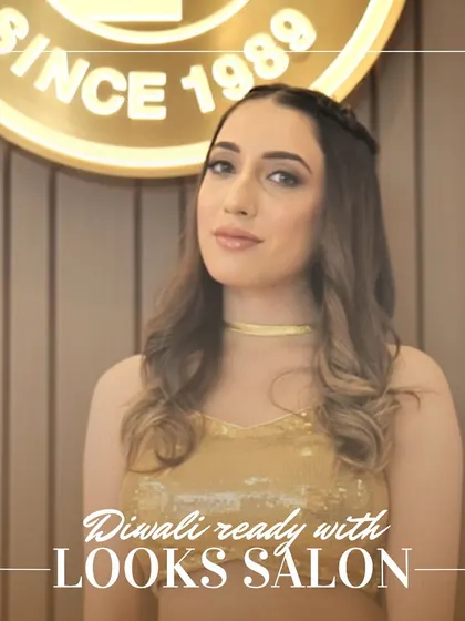 A final pose showing off the complete Diwali look. The makeup is elegant and festive, designed to make our client feel confident and beautiful during the festival of lights.
