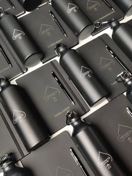 Another view of the bulk corporate gift order, showing the personalized names on each notebook. I ensure every item is perfectly customized, even in large quantities.