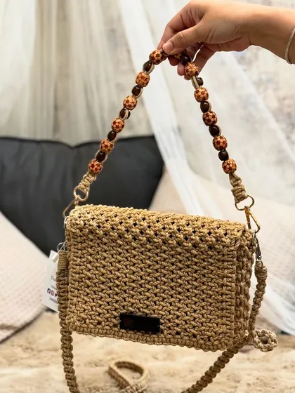 A unique box sling bag with a beaded strap. I love experimenting with different handle and strap styles!
