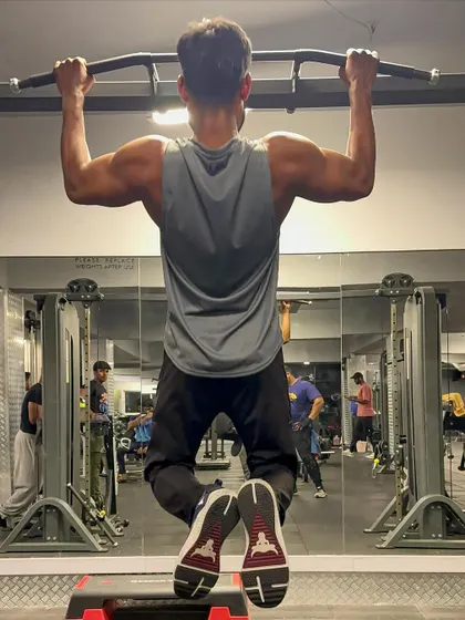 Another angle of the pull-up, a testament to the power of bodyweight training for building a formidable back.