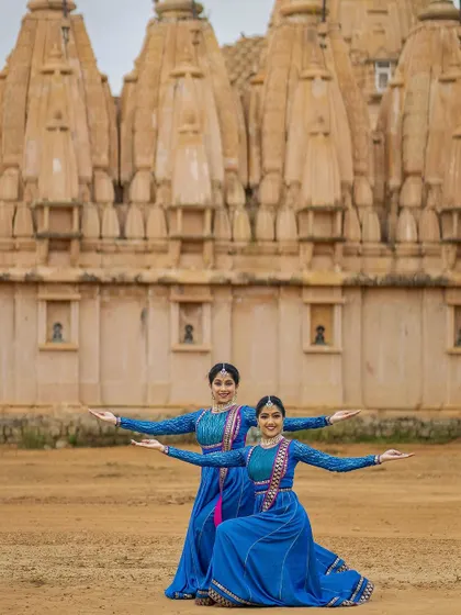 Another shot of our synchronized pose, showing the precision and unity we strive for. This is the result of countless hours of practice together.