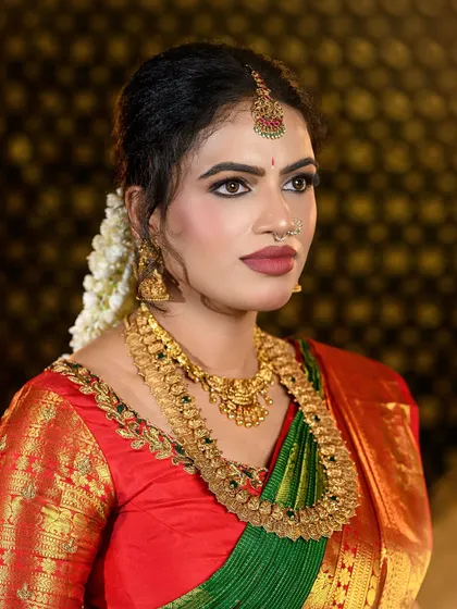 Another angle of my Varamahalakshmi pooja look, showcasing the flawless base and the intricate details of the jewellery.