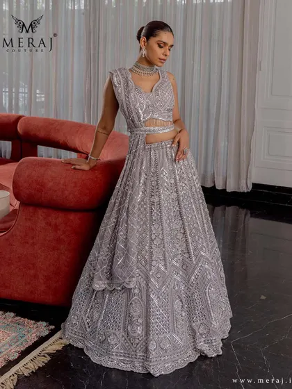 A full view of the silver-grey lehenga, showcasing its structured cuts and refined beauty that redefine bridal sophistication.