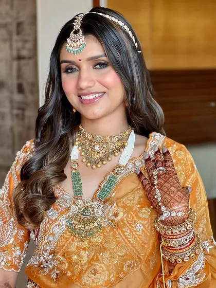 A final portrait of the bride. The makeup is designed to look beautiful from every angle, ensuring she is picture-perfect on her big day.