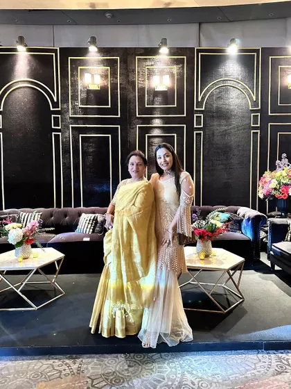 Two clients showcasing different styles. On the right, the pearl overlay sharara, and on the left, a custom ruffled gown, showing the versatility of my designs.