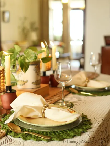 A wider view of the tablescape, where the handmade placemats help create a warm and welcoming atmosphere for guests.
