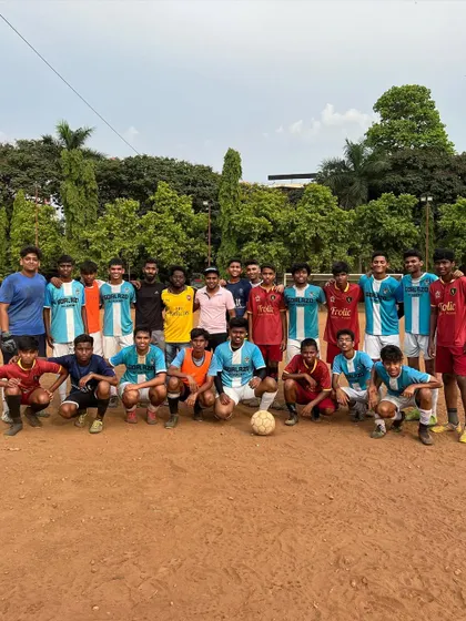 Both teams posing together after a competitive practice match, highlighting the sportsmanship and respect in youth football.