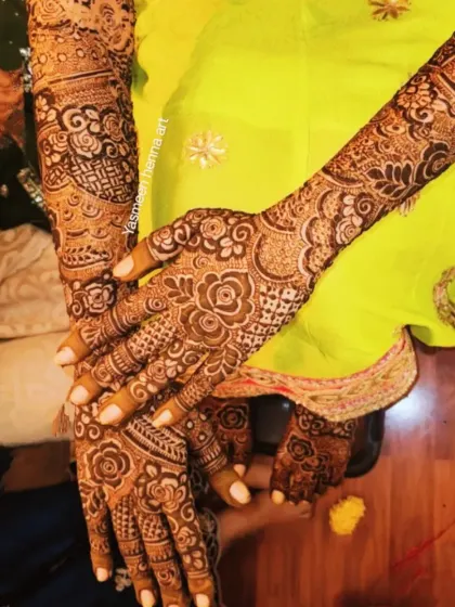 The beautiful tradition of mehndi is captured in this photo, showing a detailed bridal design with a rich, developing stain.