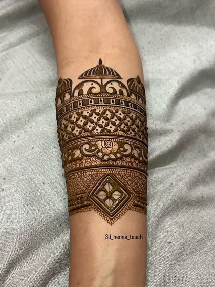 The arm band design with an added geometric element. The combination of architectural, floral, and geometric patterns creates a unique and modern look.