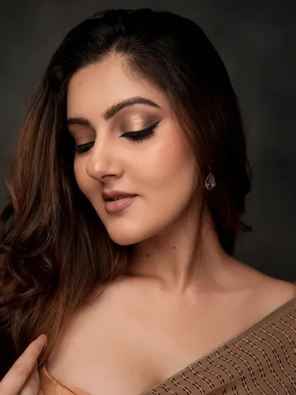 A soft and dreamy shot where the makeup looks ethereal. The shimmery eyeshadow and flawless skin create a truly angelic look.