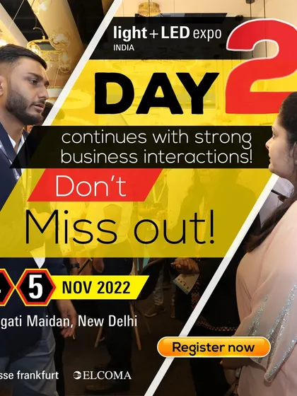 Day 2 continues with strong business interactions, as seen in this photo of an exhibitor and visitor in discussion.