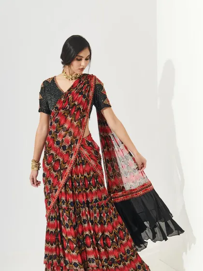 A look from the Shopverb summer collection, featuring a printed ruffled saree. The makeup is soft and natural, with a clean finish that is perfect for an e-commerce catalogue.