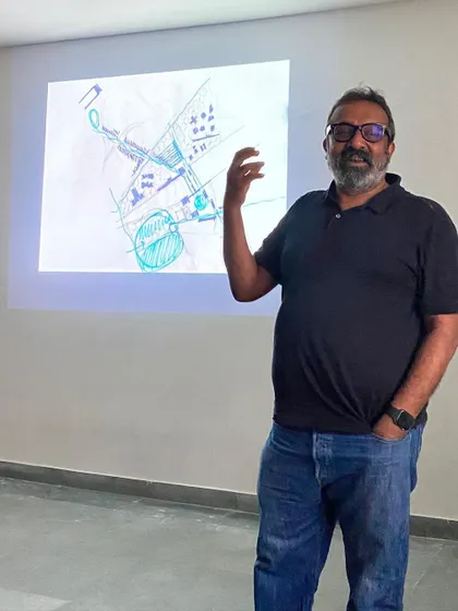 A colleague presents his conceptual sketch during a design charette. Teaching is also a process of learning from my peers and engaging in a continuous dialogue about architectural ideas.