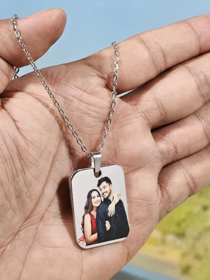 Keep your loved ones close with a custom photo pendant. I can print a high-quality color photo on this durable metal tag, which comes with a silver chain.