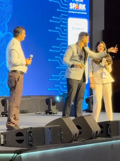 Interacting with volunteers on stage during the Cyber Security Leaders event.
