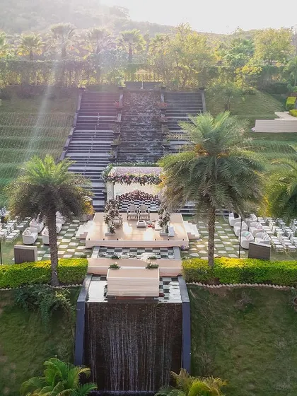 An aerial view of the minimalistic yet traditional mandap at Taj Aravali, Udaipur, showing how our design complements the grand landscape.