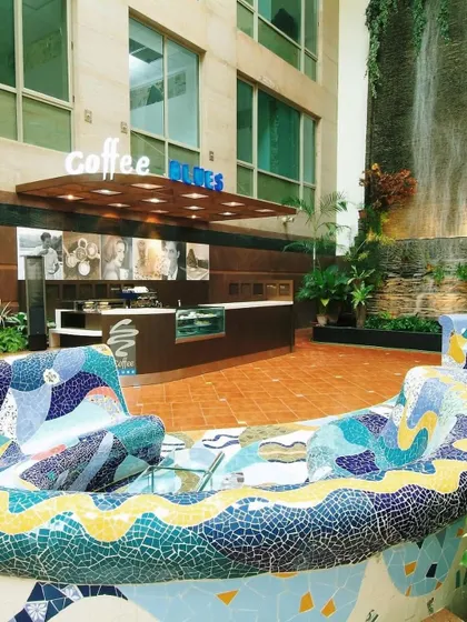 Custom ceramic mosaic seating designed for Yashraj Studios in Mumbai. This functional art piece turns a simple seating area into a storytelling element, with vibrant, flowing patterns that reflect the creative energy of the film studio environment.
