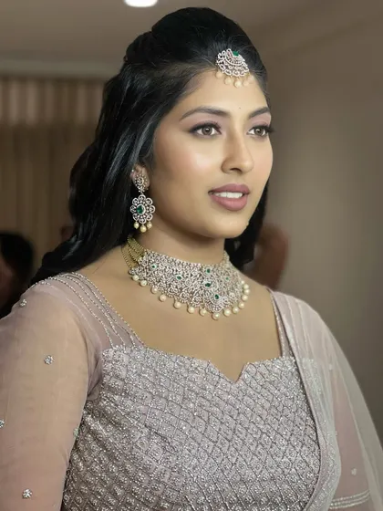 This look is all about soft, glittery elegance. You'll learn how to apply shimmer and glitter in a sophisticated way that enhances the eyes without being overpowering.
