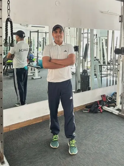 A confident stance, ready to take on new fitness challenges with my clients.