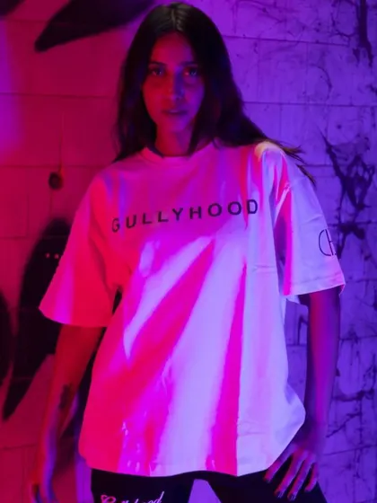 Using colored gels in the studio to create a vibrant, edgy look. This technique is perfect for making simple t-shirts look visually exciting for social media and online stores.