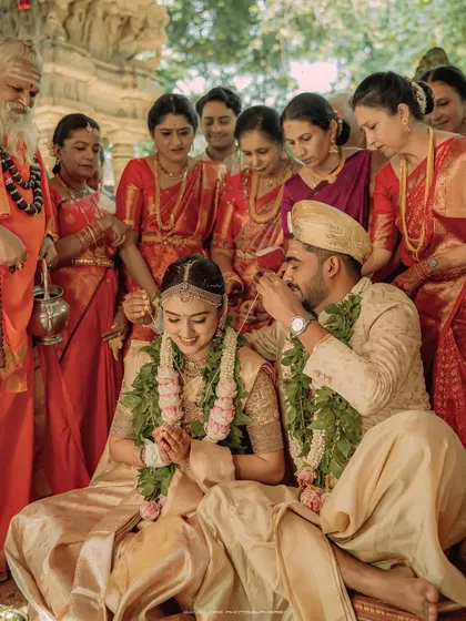 Surrounded by family and tradition, the couple participates in a sacred wedding ritual. I focus on the reverence and emotion of these key ceremonial moments.
