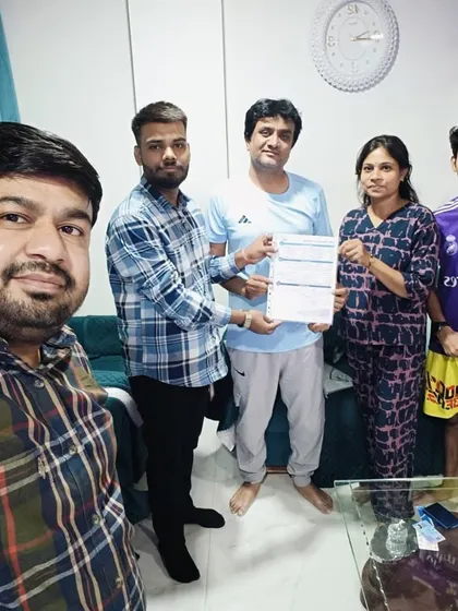 A family holds their new solar agreement, excited to start their journey towards energy independence.