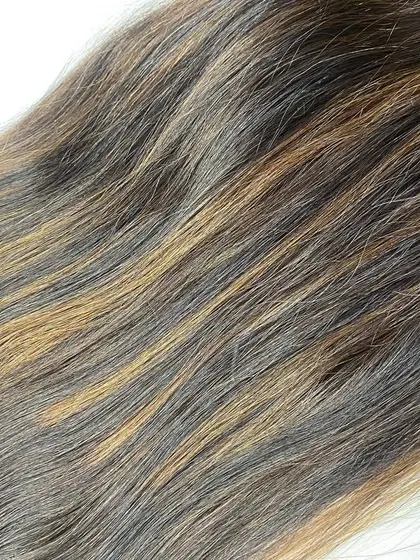 The beautiful, natural-looking highlights in this clip-on set are designed to blend seamlessly with the client's own hair color.
