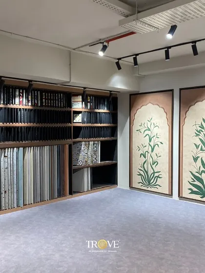 In this section of my showroom, you can see how I pair large, nature-inspired art panels with extensive sample libraries. This allows you to find the perfect complementary textures and colors for your feature wall.