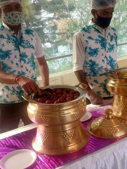 A closer view of the Gulab Jamun serving station. My team ensures every guest gets a warm and delicious dessert.