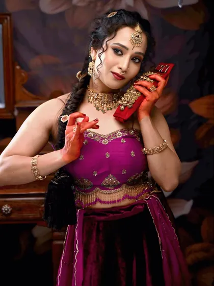 A playful and modern shot, perfect for a cocktail party or sangeet. The makeup is fun yet sophisticated.