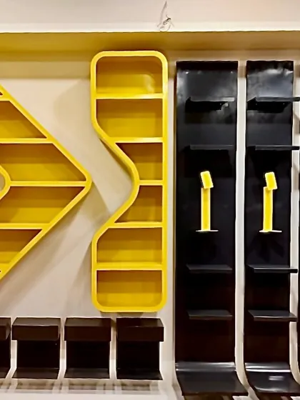 Custom display units designed for Eeken, a lifestyle brand from Paragon. We translated the brand's edgy logo, which features a reversed 'K', directly into the shape of the shelving.