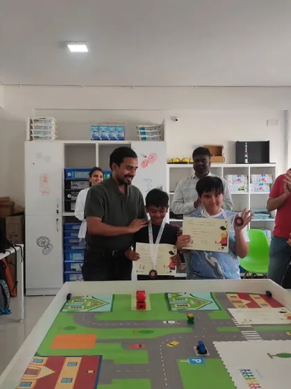 Winners of our internal autonomous school bus competition receive their certificates and medals. The joy and pride on their faces are the best rewards for their hard work.