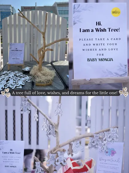 A tree full of love, wishes, and dreams for the little one! The wish tree is a beautiful way for guests to leave heartfelt messages for the baby, which the parents can cherish forever.