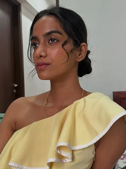 A beautiful, natural makeup look for the jewellery brand Zoei. The focus is on warm, glowing skin to complement the model's complexion and the delicate jewellery.