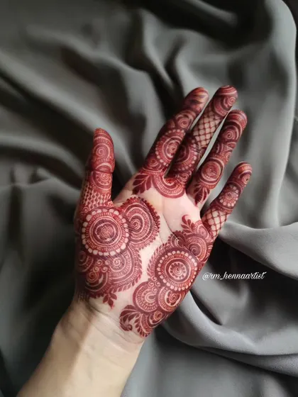 A full hand view of this incredible stain. This is the result of leaving the natural henna on for a good amount of time and proper aftercare.