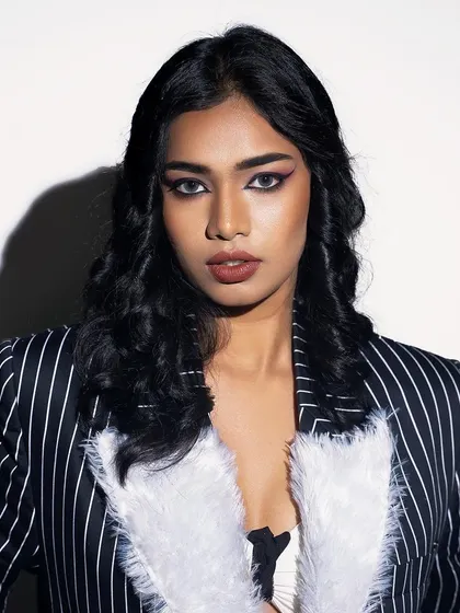 A powerful portrait from a vintage Hollywood-themed shoot. The model is wearing my custom pinstripe blazer with a white faux fur collar.