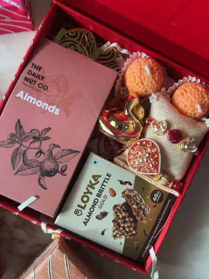 A collection of detailed shots and videos showcasing the variety of items, packaging, and happy moments from my Rakhi collection.