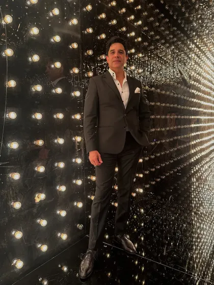 My motto is simple: Raat bhi lit, vibe bhi fit. This photo, taken before a big night, captures the stylish and focused energy I bring to every event, ensuring the atmosphere is just right.