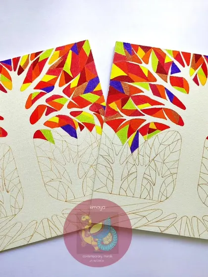 The "Tree of Life" paintings in an early stage. The outlines are done, and I've started filling in the vibrant, warm colors of the leaves, creating the stained-glass effect piece by piece.