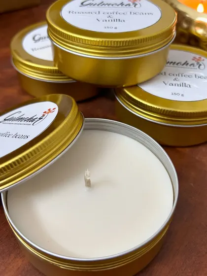 My roasted coffee beans and vanilla scented candles in golden tins. These are great for travel or as budget-friendly gifts.