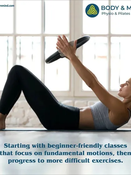 I begin with beginner friendly classes that focus on fundamental motions, like this mat exercise using a Pilates ring, before progressing to more challenging movements.